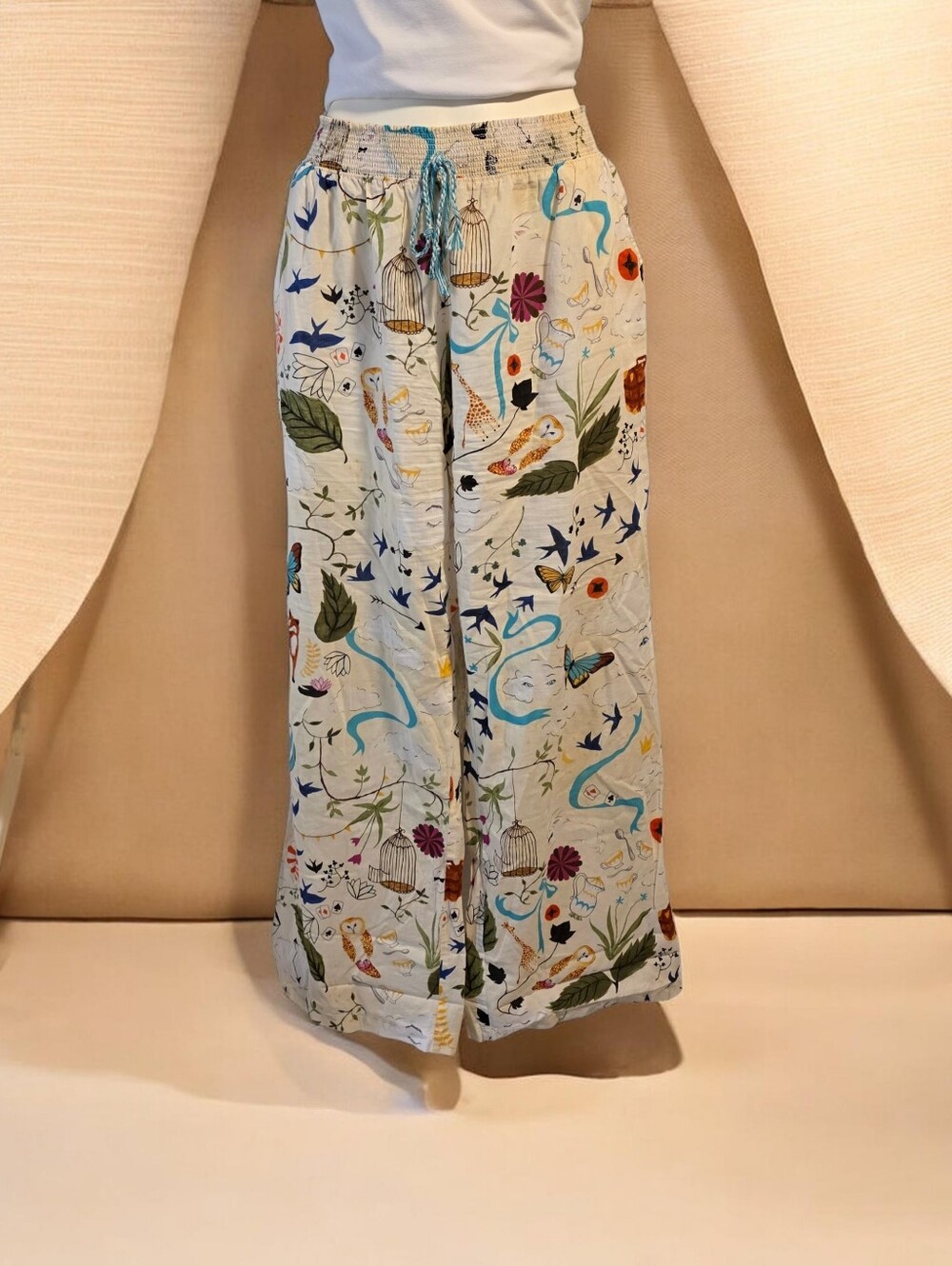 **Whimsical Storybook Print Wide Leg Palazzo Pants**